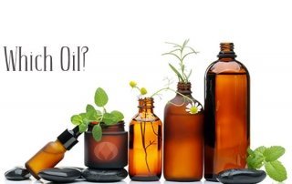 oil bottles with herbs and black stones