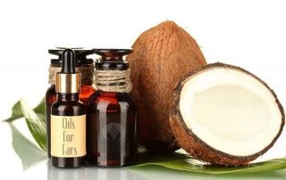 tinted oil bottles and coconuts