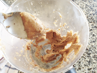 blending honey into almond butter